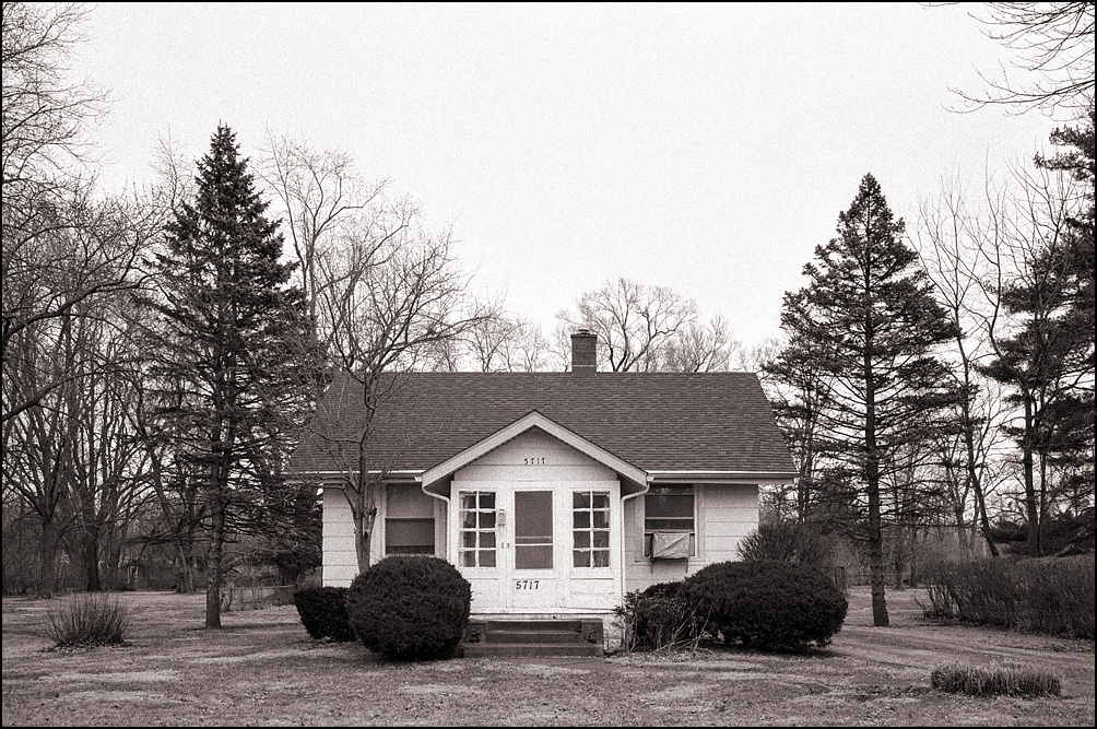 Photograph of a house on an overcast day.